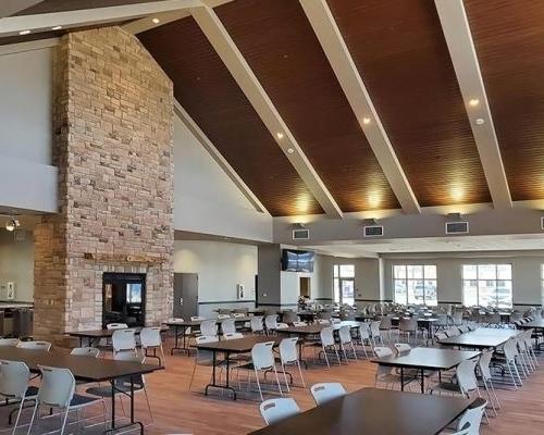 Dining Facility interior with stone fireplace